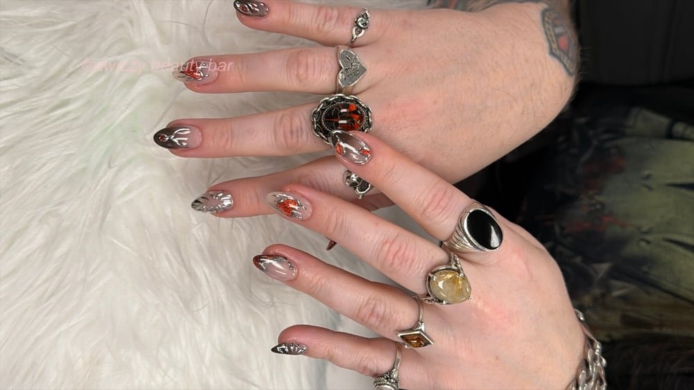 Chrome & Orange Glitter nail art at Swizzy Beauty Bar, Japanese gel nails Flushing NY