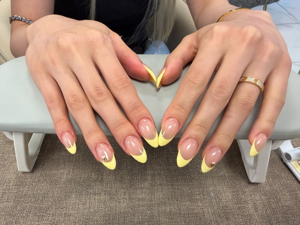 Yellow French Tips nail art at Swizzy Beauty Bar, Japanese gel nails Flushing NY